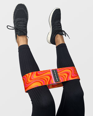 Orange swirl print fabric resistance band