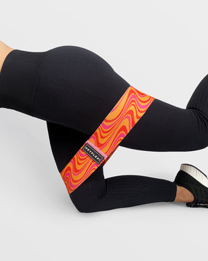 Orange swirl print fabric resistance band