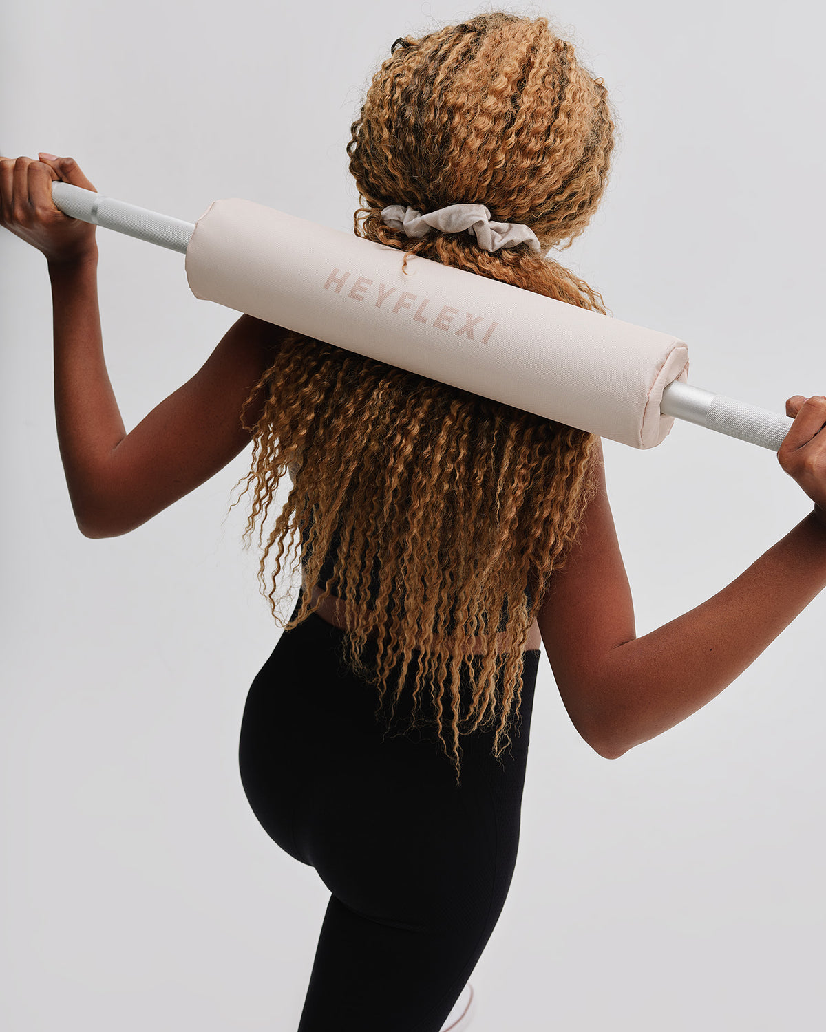 Neutral coloured barbell pad