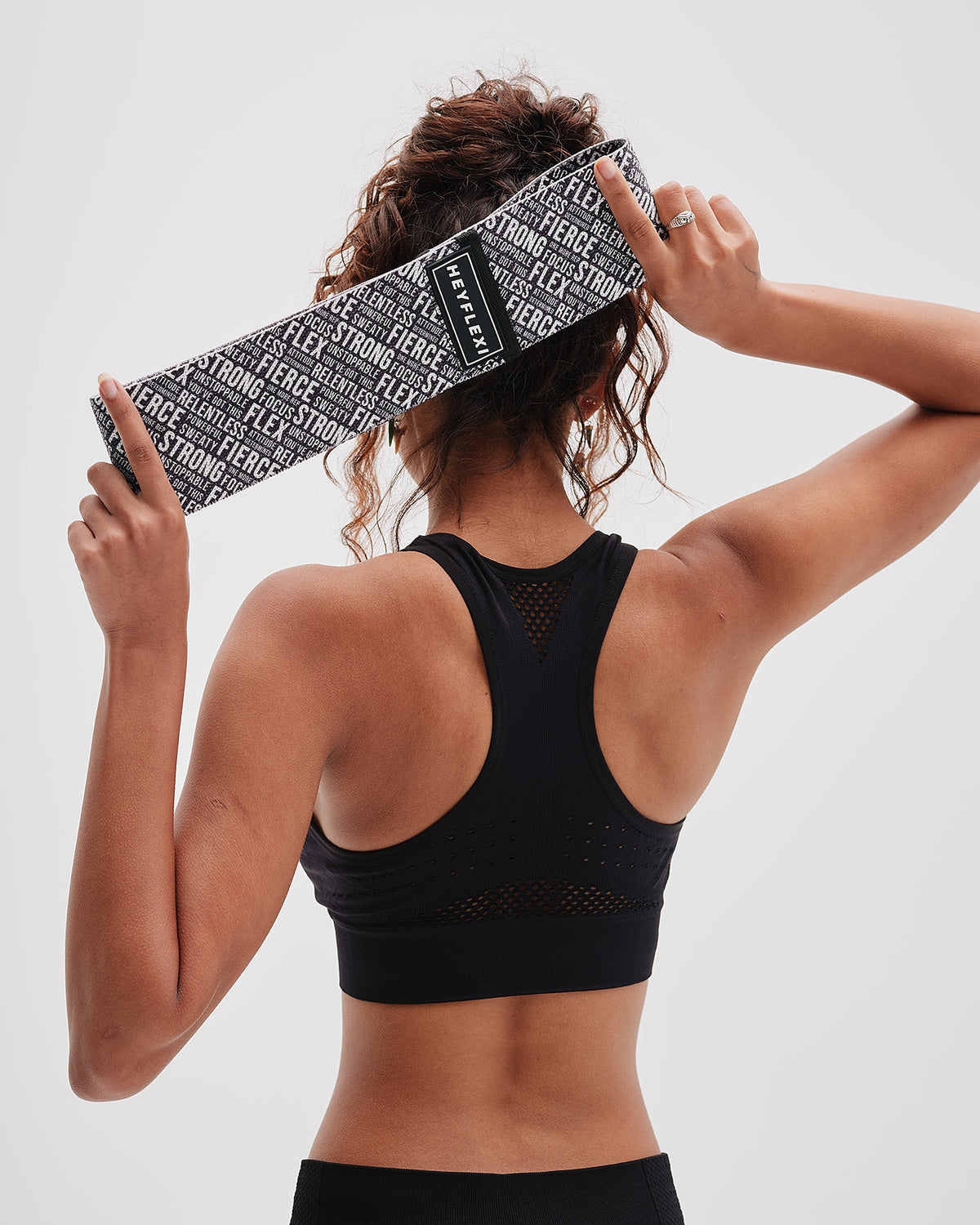 black and white empowering text print resistance band